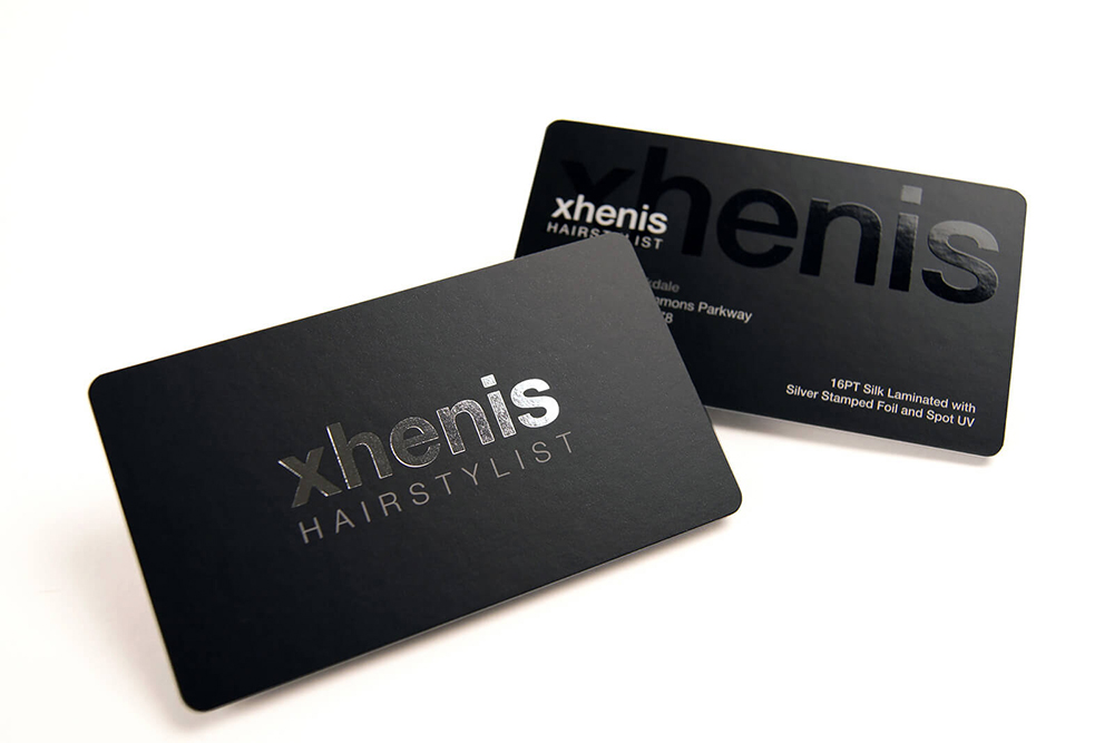 This is a Black business card with Spot UV. We'll discuss CMYK rich black values to ensure your card is printed in true black. 