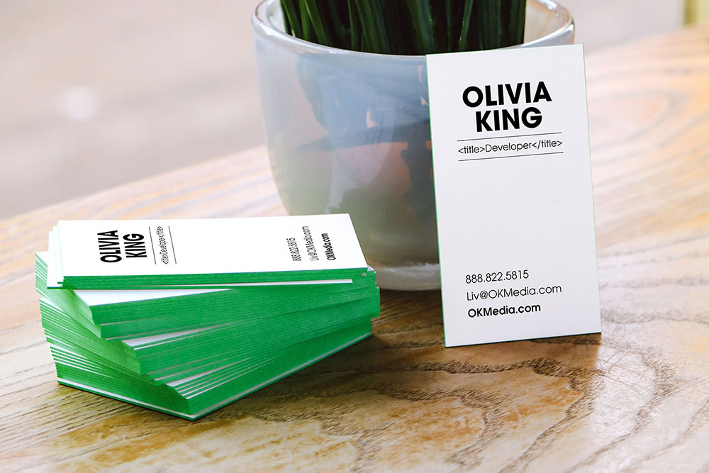 Green painted edge business cards.