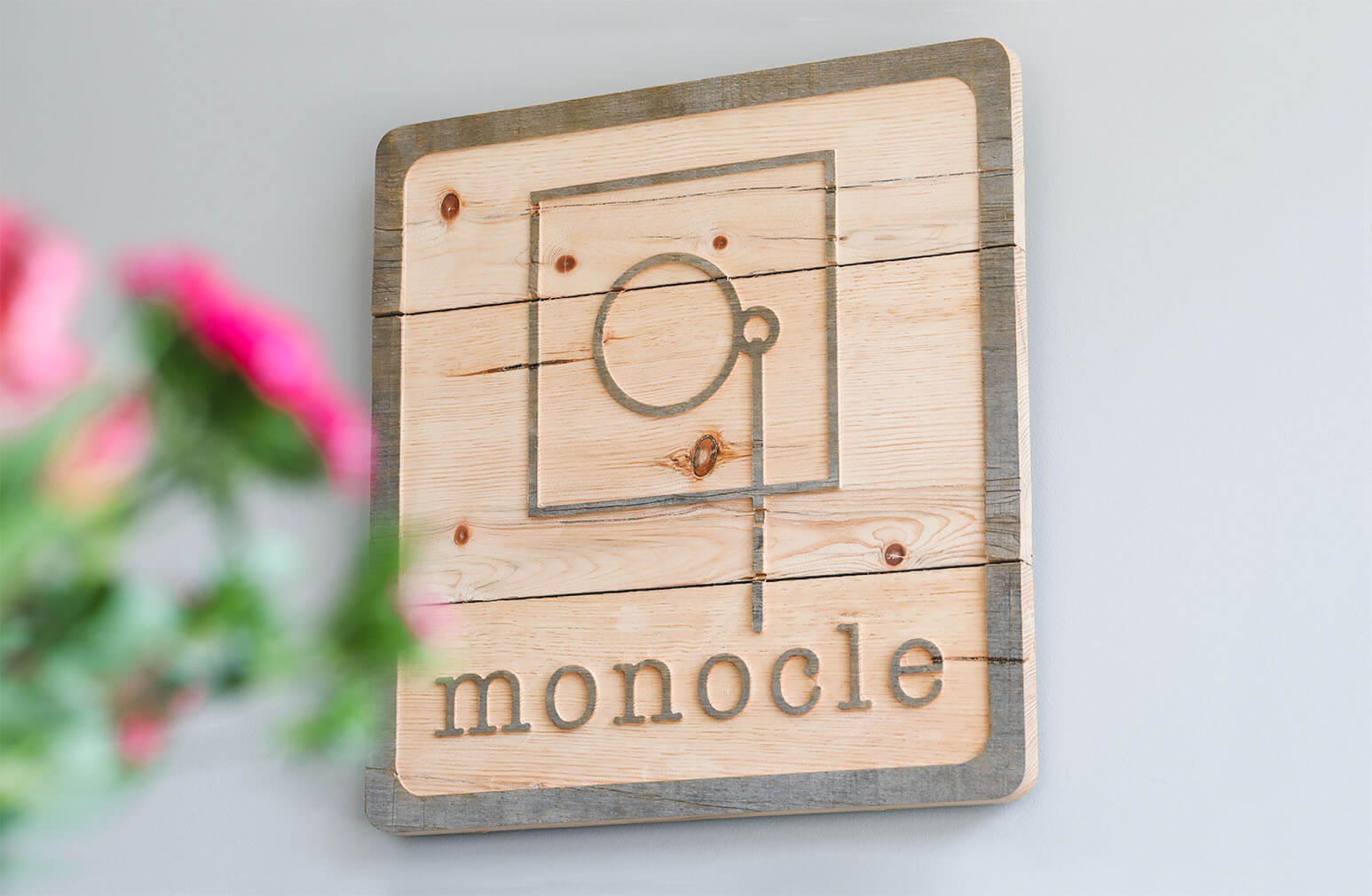 Custom logo design for Monocle Eye Care & Eyewear Gallery.