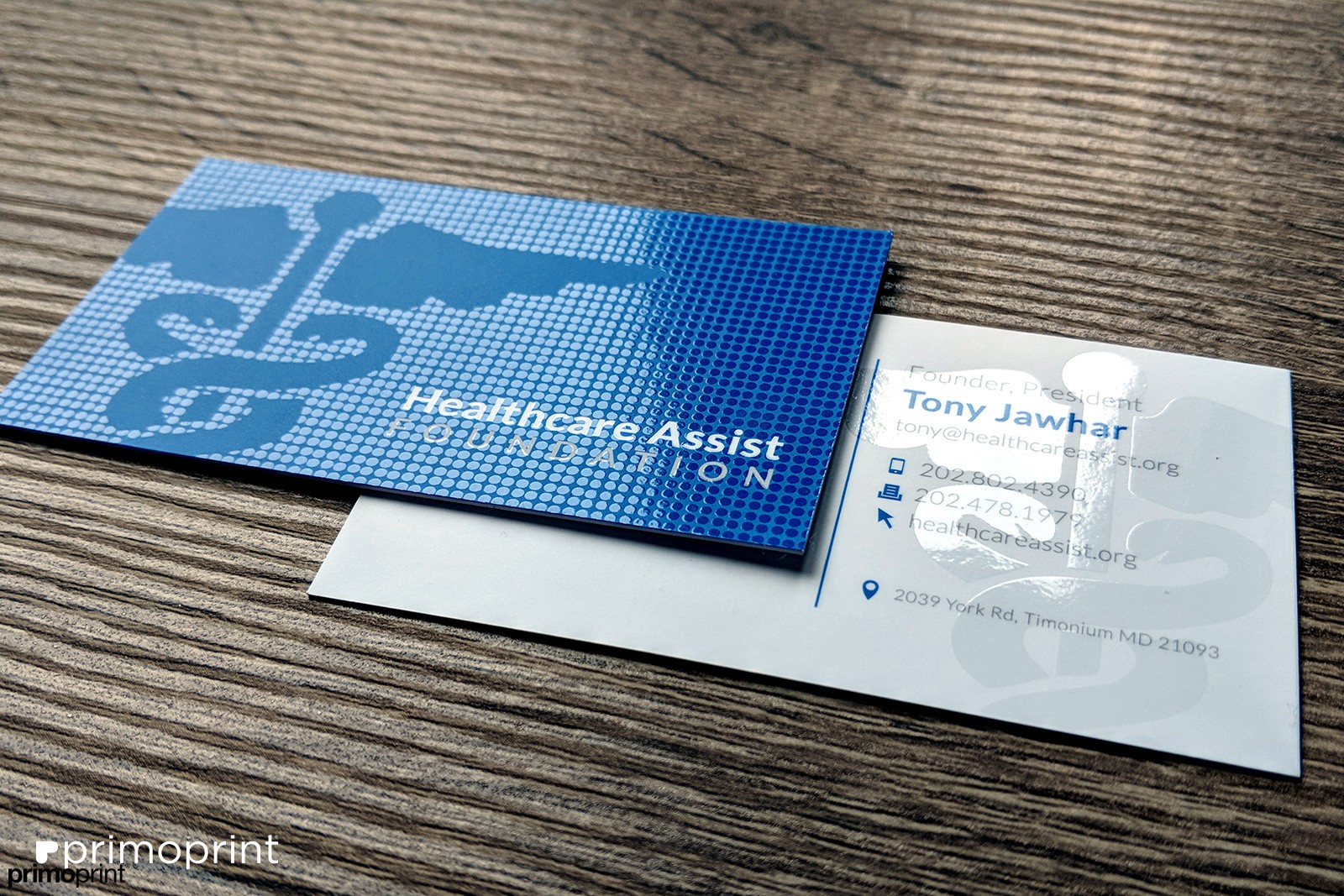 Custom designed Silk Business Card with Spot UV. Design by Primoprint.