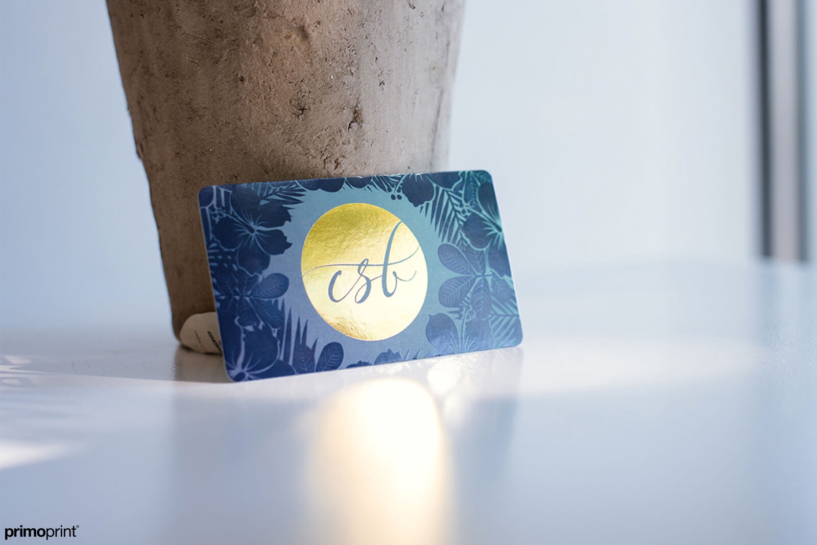 Stand out with our gold stamped foil business card with Spot UV and rounded corners.
