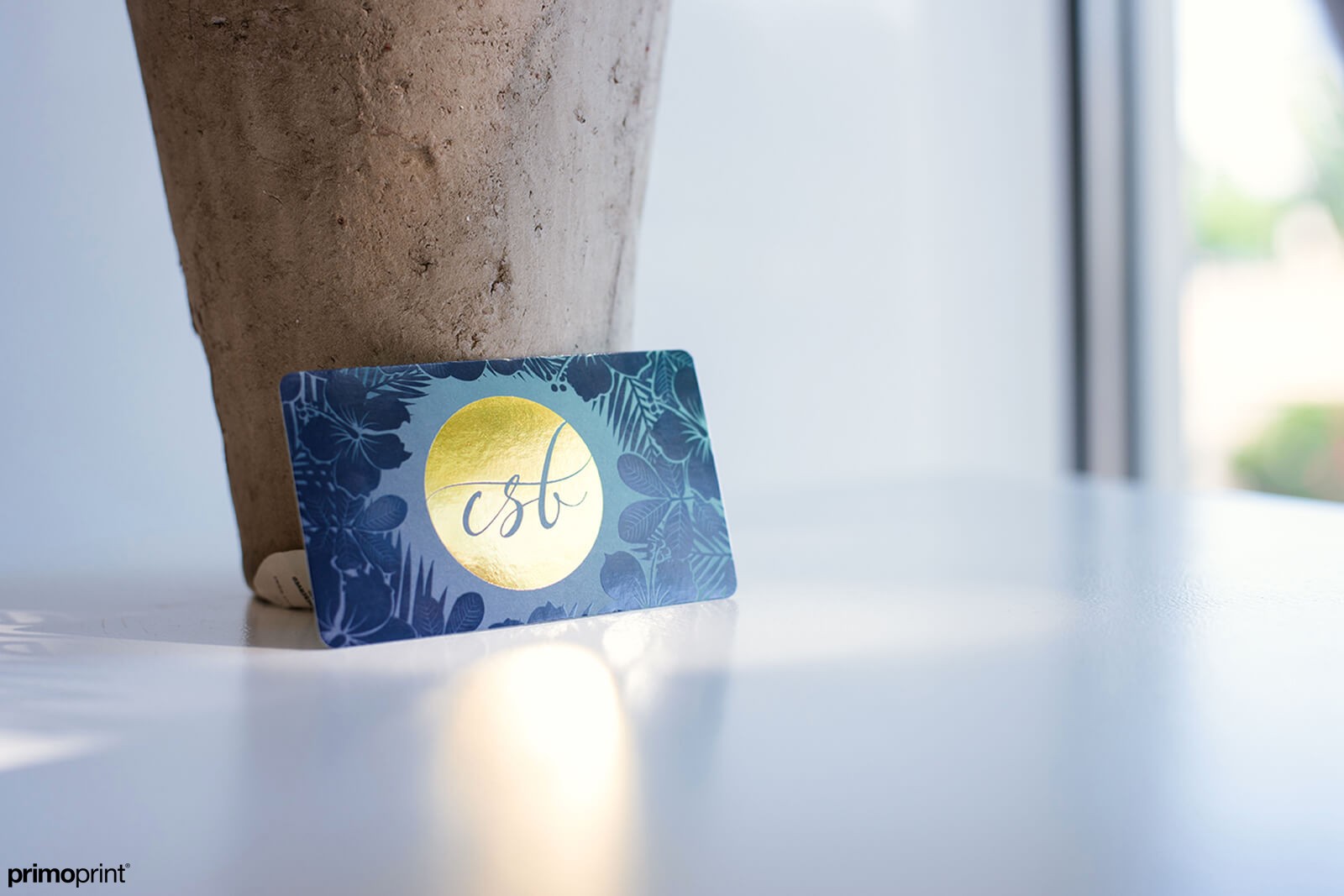 Stand out with our silk laminated business card with gold stamped foil and rounded corners.