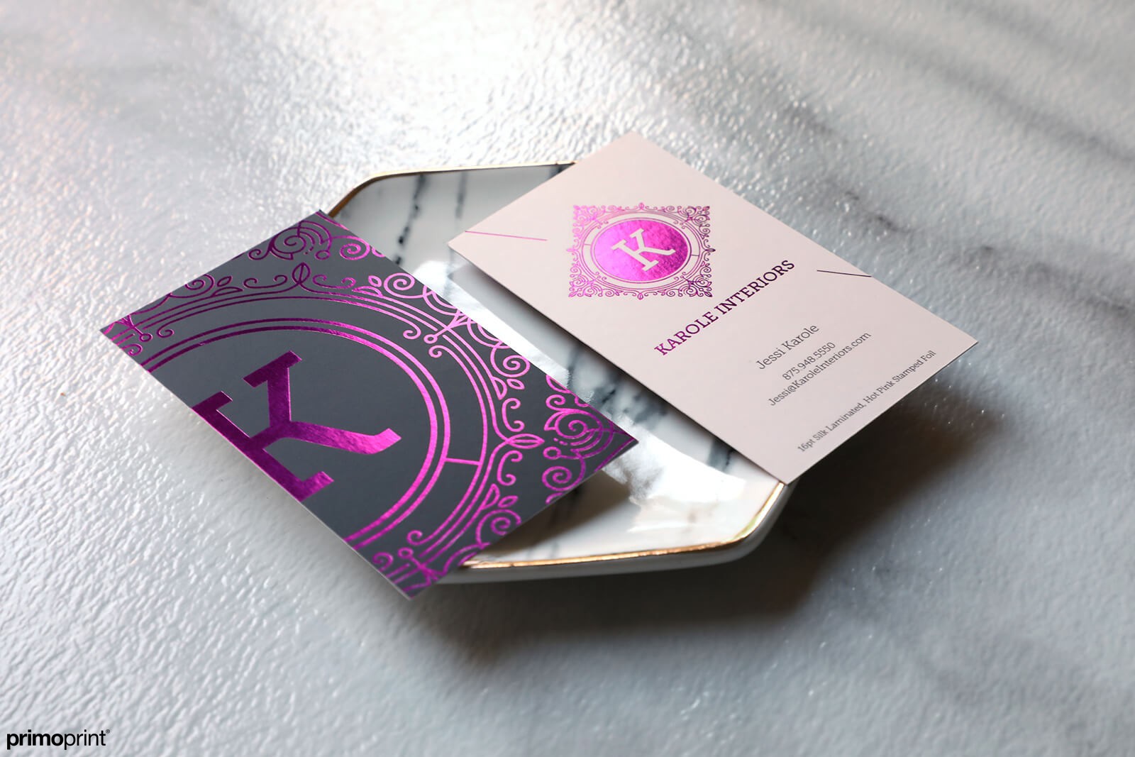 Custom 19PT Silk Laminated business card with Hot Pink Stamped Foil designed by Primoprint.