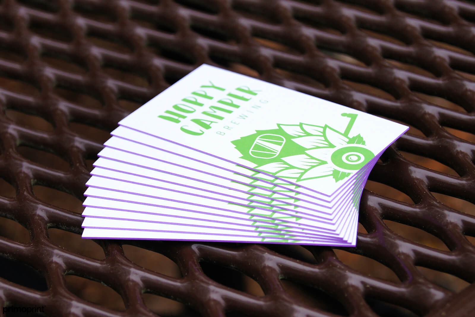 32PT thick purple edge business cards printed for Hoppy Camper. Cards designed by Primoprint.