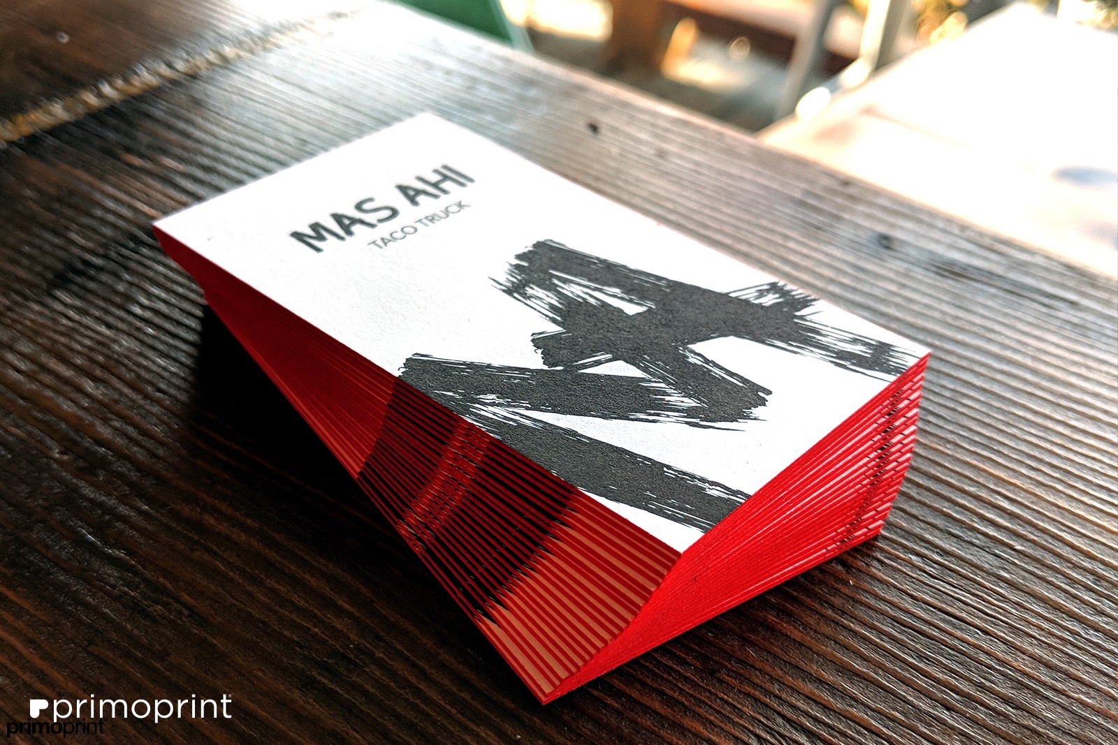 Printed on 32PT thick uncoated card stock with red painted edges. 