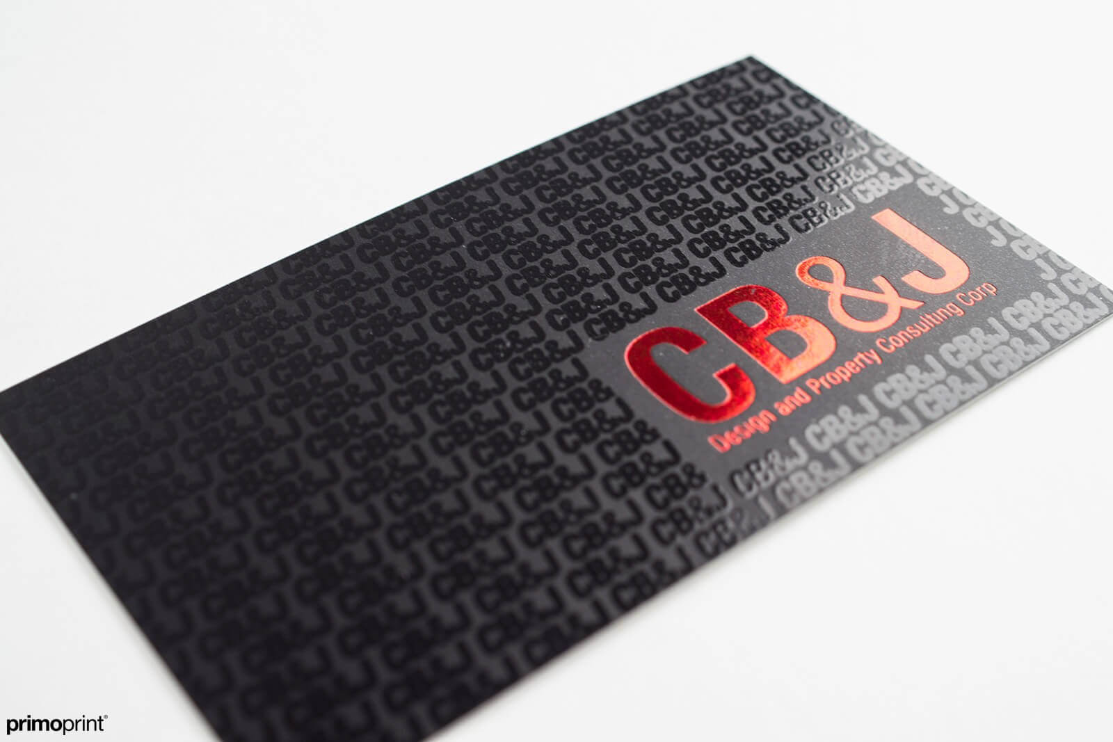 19PT Silk Laminated business card with red Stamped Foil and Spot UV. 