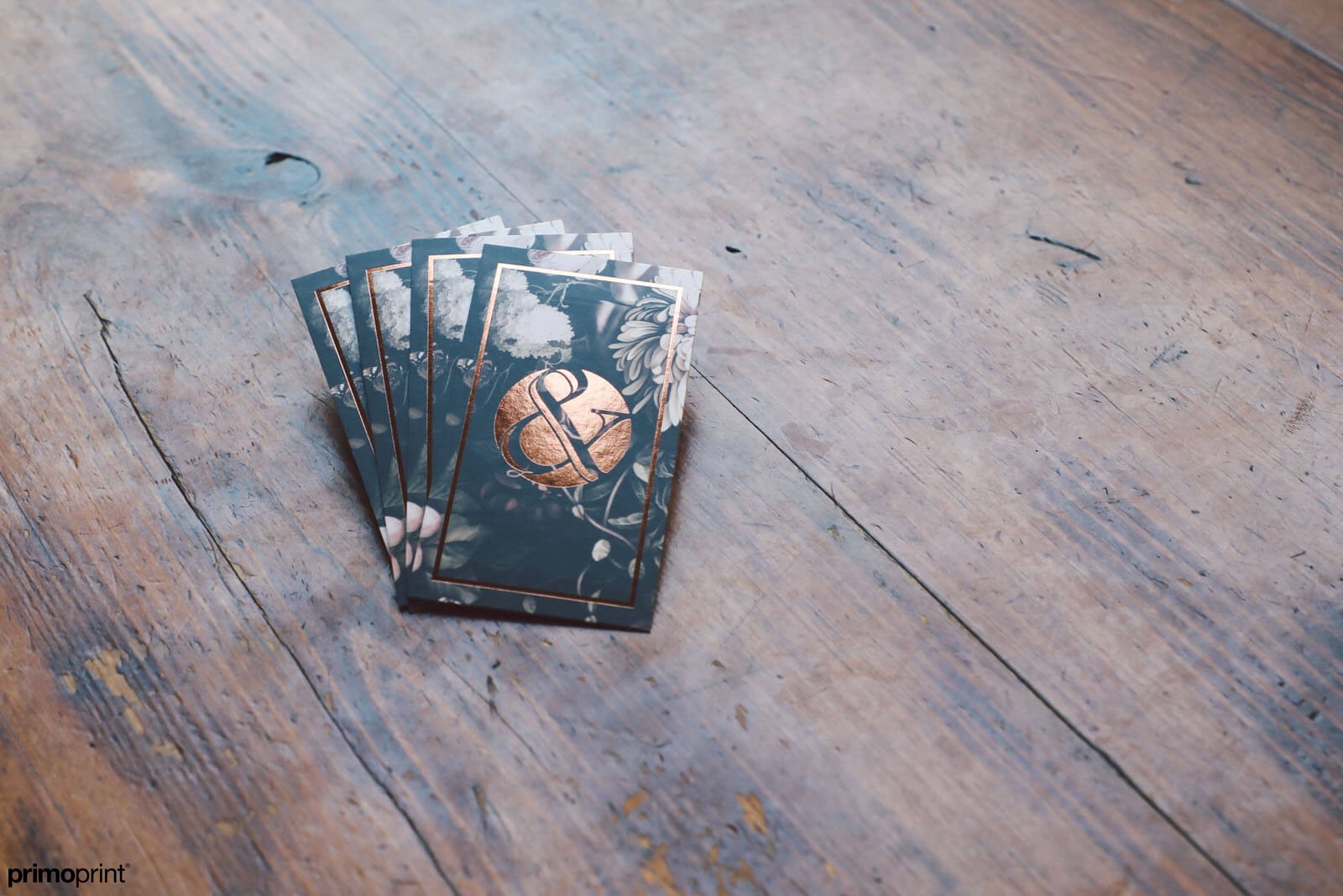Premium 19PT Silk business card with copper Stamped Foil.