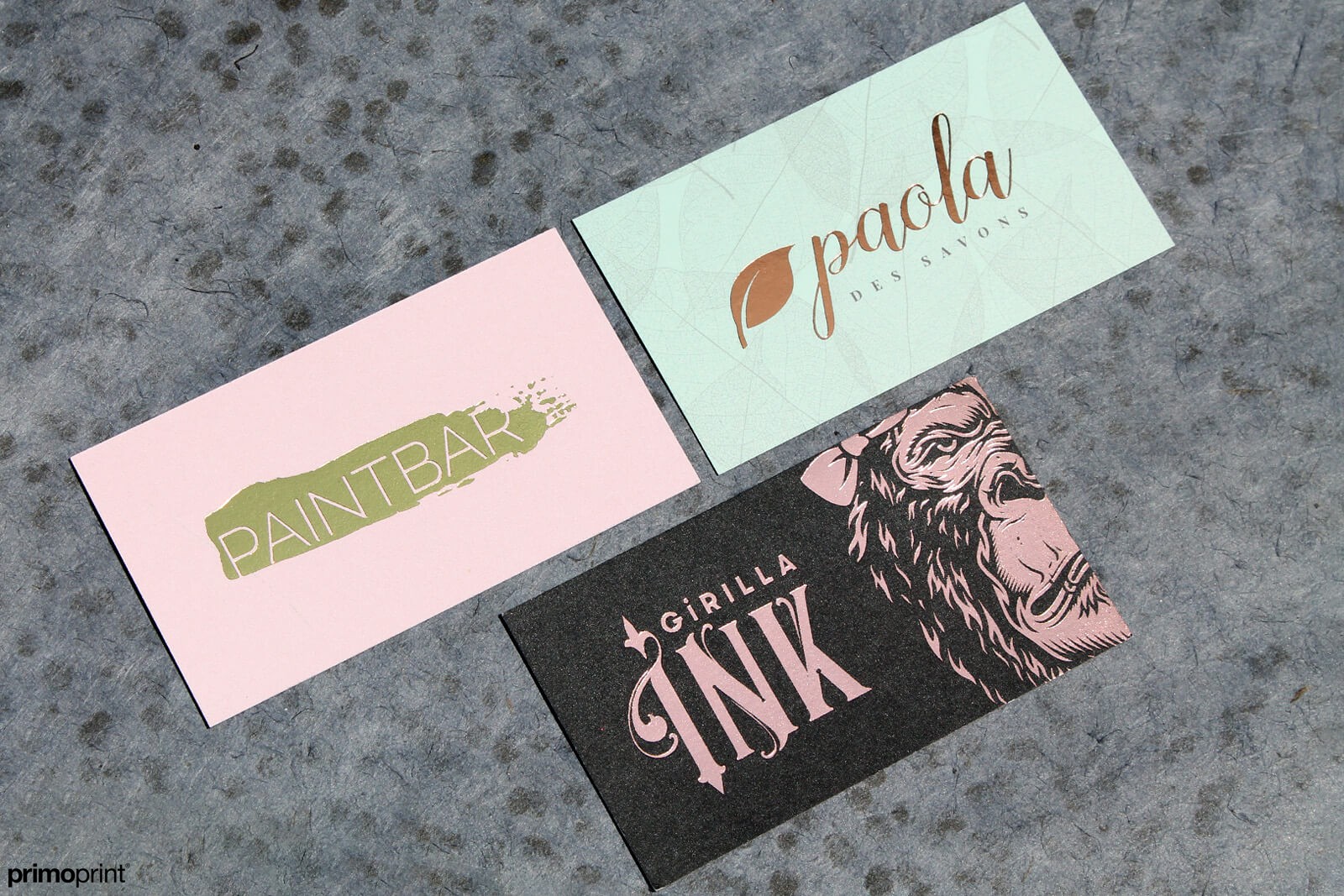 Comparison of Business Cards with Gold, Copper, and Rose Gold Stamped Foil. 